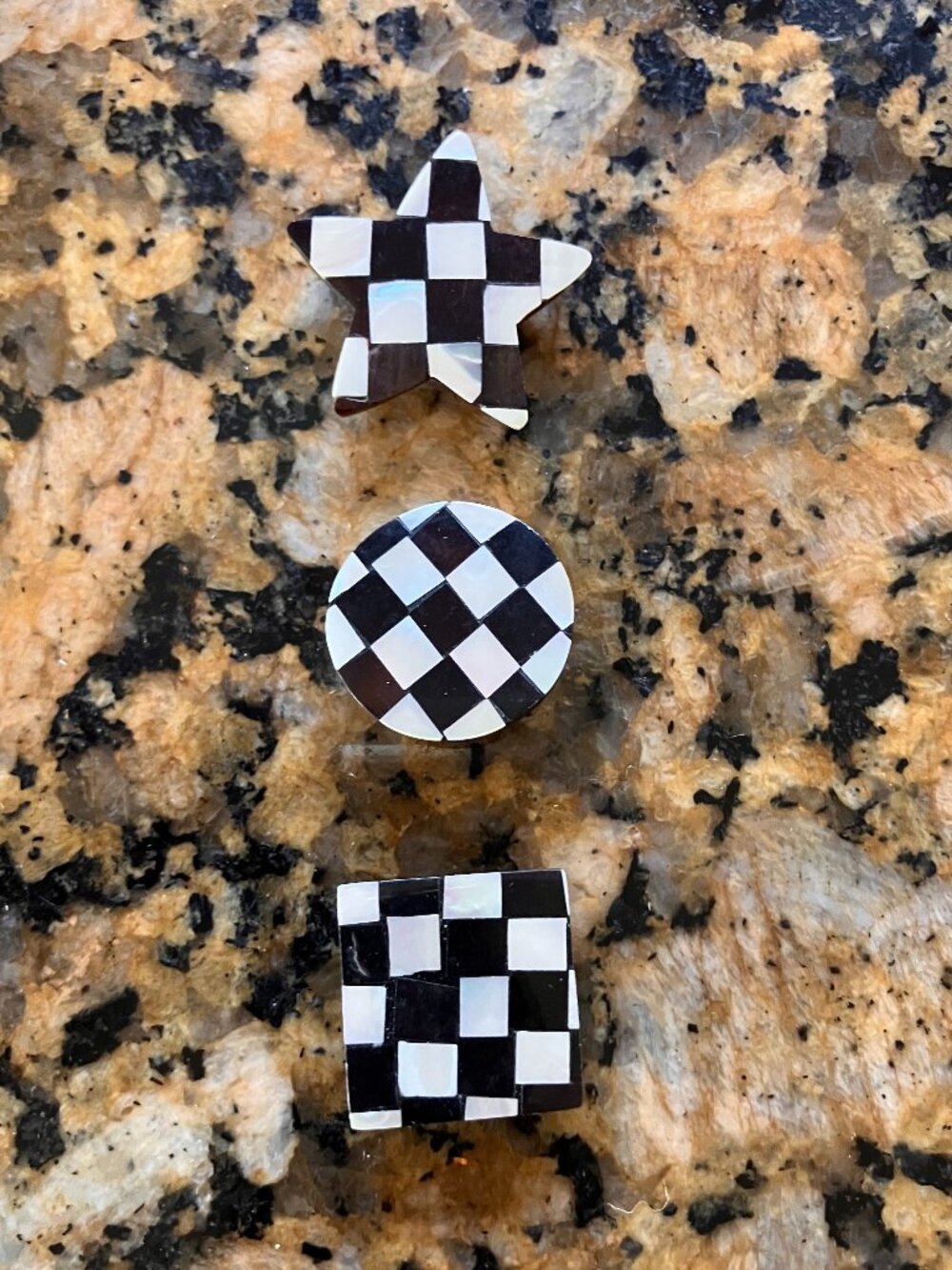 Checkered button covers